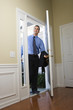 Businessman coming home. Businessman coming home.