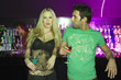 Couple standing at a bar counter