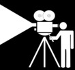 stick man or figure filming with a movie camera 