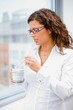 Business woman drinking coffee