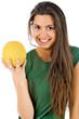 Happy girl holding yellow melon in hand, isolated on white Happy girl holding yellow melon in hand, isolated on white