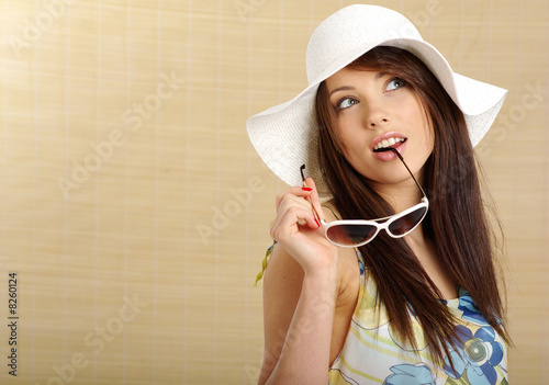 Photo : summer girl in white cap summer girl in white cap
