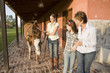 Three generation family with horse