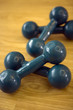 Close-up of two pairs of dumbbells
