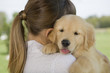 Woman holding puppy