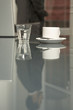 Reflection of a businessman on a table