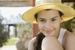 Portrait of young girl in hat