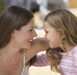 Portrait of a mother and her young daughter, close-up