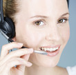 A young woman wearing an audio headset