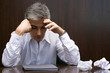 Close-up of a businessman looking depressed