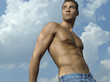 Low angle view of a young man standing