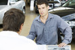 A young man buying a new car
