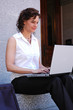brunette business woman working outdoors on wireless laptop brunette business woman working outdoors on wireless laptop