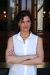 brunette business woman with arms folded brunette business woman with arms folded