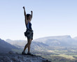A climber celebrating reaching the top