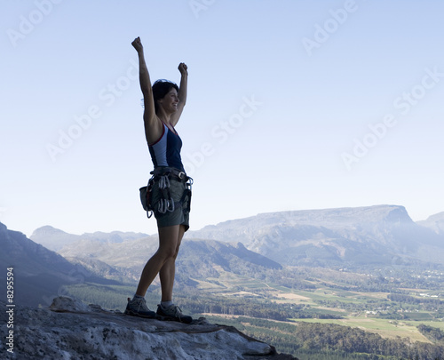 Photo: A climber celebrating reaching the top A climber celebrating reaching the top