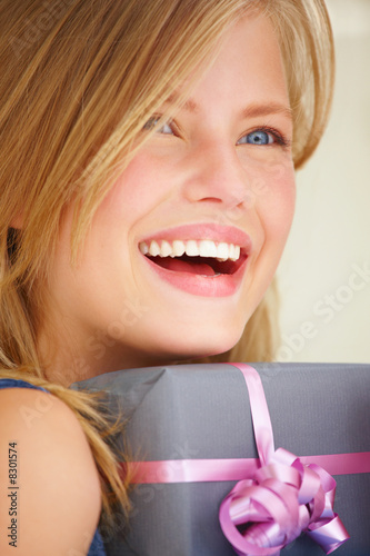 Photo: Young girl with gift Young girl with gift
