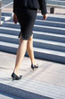 Businesswoman Walking on Stairway
