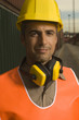 Portrait of a dock worker wearing a hardhat
