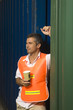 Dock worker holding a disposable cup
