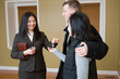 Image : Realtor giving key to couple
