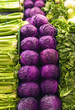 Photo: Selection of green leaf vegetables, celery and red cabbages on display on stall, close-up (full frame) Selection of green leaf vegetables, celery and red cabbages on display on stall, close-up (full frame)