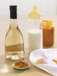 Close-up of a baby bottle with a wine bottle