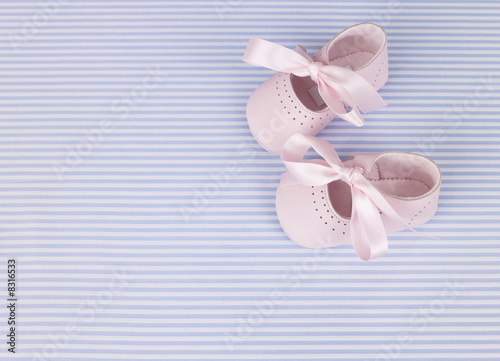 Photo: High angle view of a pair of baby booties High angle view of a pair of baby booties