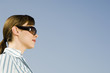 A businesswoman wearing sunglasses
