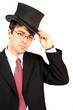 business man lifting his top hat in salutation and welcome business man lifting his top hat in salutation and welcome