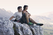 Two climbers resting at the top