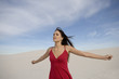 A young woman in a red dress