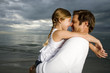 A father and daughter on a beach