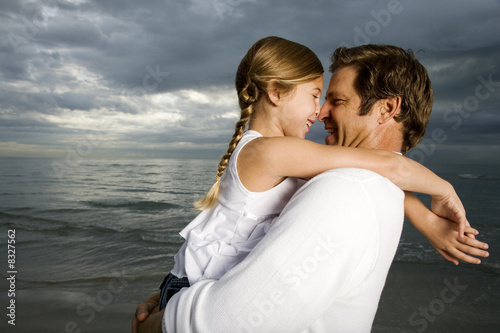 Photo: A father and daughter on a beach A father and daughter on a beach