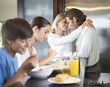 A family eating breakfast