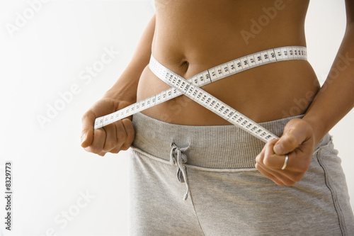 Photo: Woman losing weight Woman losing weight