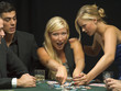 Women fighting over poker chips