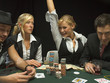 Happy woman at poker game