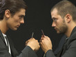 Men facing off with playing cards