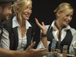 Happy women at poker game