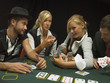 Happy woman winning at poker game