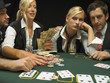 Upset woman at poker game
