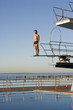 A diver standing on a diving board