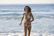 A woman running on the beach