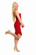 Coquettish young woman dressed up in red