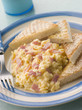 Photo: Cheesy Scrambled Egg with Ham and Toasted Triangles Cheesy Scrambled Egg with Ham and Toasted Triangles