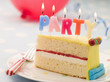 Photo: Party Candles on a Slice of Birthday Cake Party Candles on a Slice of Birthday Cake