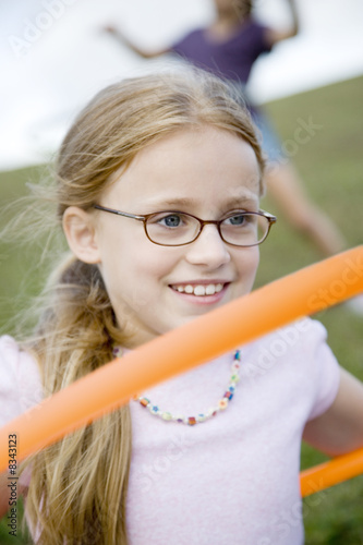 Photo: A young girl playing A young girl playing