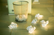 Waste paper scattered around a bin