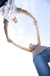 Two young lovers holding hands